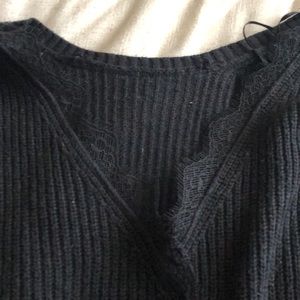 Hollister black knit sweater with lace detail.